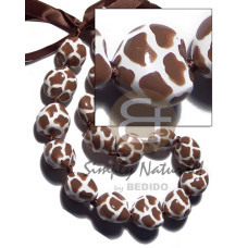 Kukui seeds in animal print