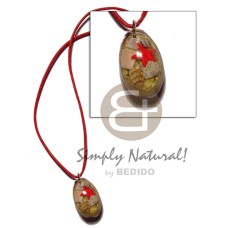 Laminated cowrie shell pendant in Laminated cowrie shell pendant in