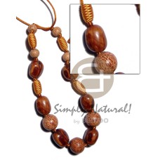 Capsule wrapped wood beads Capsule wrapped wood beads